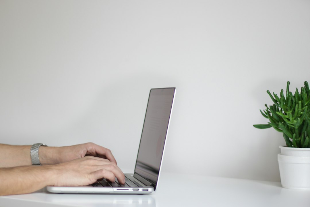 Laptop used to prepare an email promotion for construction professionals